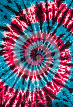 Red, Blue and Black Retro Abstract Psychedelic Tie Dye Swirl Design on cotton shirt.