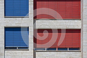 Red and blue blinds on the windows