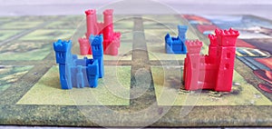 Red and Blue Castle Game Pieces for a Board Game