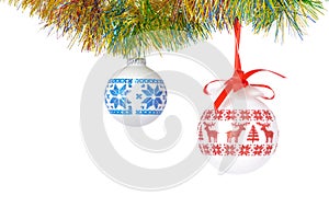 Red and blue Christmas tree toys and tincel branch