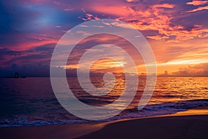 Red blue dark sky in the morning beach