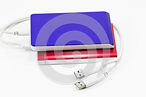 Red and blue external hard disk isolated on white background isolated on white background