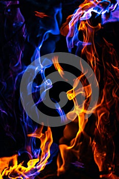 Red and blue fire on balck background