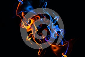 Red and blue fire on balck background