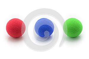 Red, Blue, Gree Small Sponge Balls on White Background