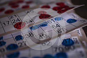 Red and blue marked Bingo cards close up