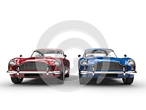 Red and blue metallic vintage cars - front view