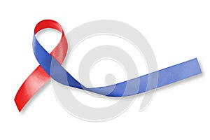 Red and Blue ribbon awareness on woman human hand aged wood for Congenital Heart Defects disease photo