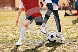 Red and Blue Soccer Players Compete in a Duel on Sunny Day. Football Game For Children. Soccer Background