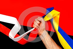 Red blue white yellow black conflict between Ukraine Poland two flag top view hand right sector confrontation