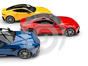 Red, blue and yellow modern electric sports cars racing -  side shot