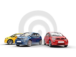 Red, blue and yellow small electric cars