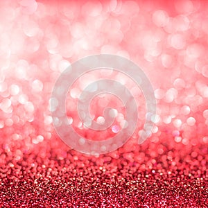 Red blur glitter Christmas and Valentine`s day bokeh background with blurry silver white sparkling light of metallic glitz texture