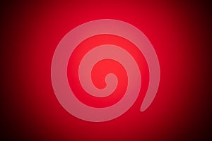 Red blurred background with strong black gradient and vignette