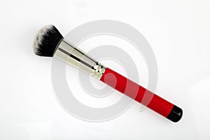 Red Blush brush for make-up on white background