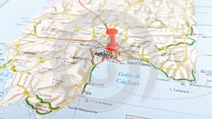 A red board pin stuck in Cagliari Sardinia Italy