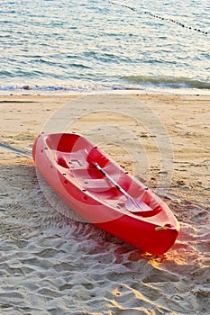 Red boat on the beach 2