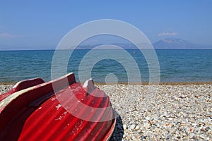 Red boat on beach