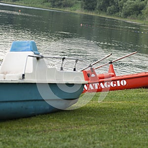 Red boat with white sign