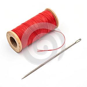 Red bobbin of thread and needle isolated on transparent background