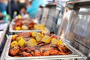 Red boiled crawfish and corn