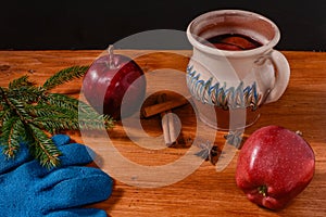 Red boiled wine on rustic wooden table