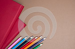 Red books and pencils