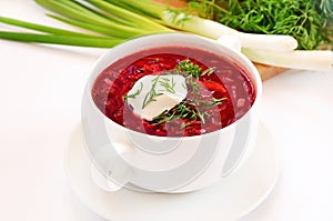 Red borscht soup with dill