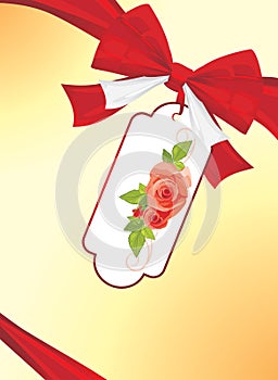 Red bow and card with roses. Festive background