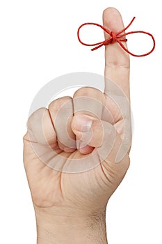 Red Bow Forefinger Reminder Isolated photo