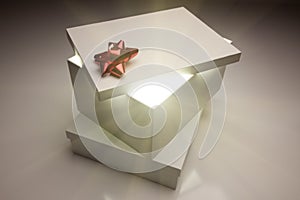 Red Bow Gift Box Lid Showing Very Bright Contents