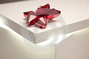 Red Bow Gift Box Lid Showing Very Bright Contents