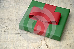 red bow green gift box placed