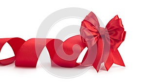 Red bow, red satin ribbon on white background