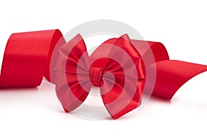 Red bow, red satin ribbon on white background