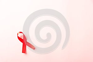 Red bow ribbon symbol HIV, AIDS cancer awareness