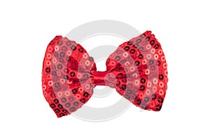 Red bow tie with spangles on white background