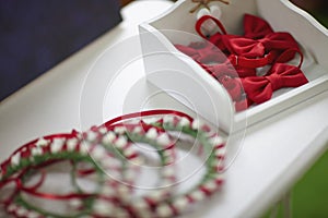 Red bow ties in a white box