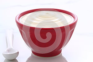 Red bowl plain yogurt