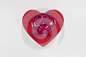 Red box as heart with ribbon 3d render