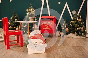 Red box for letters to Santa. Decoration for Christmas time. New Year concept