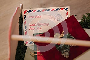 Red box for letters to Santa. Decoration for Christmas time. New Year concept