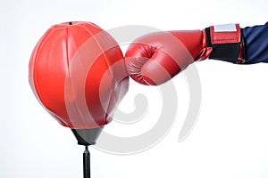 Red boxing glove punch a red punching bag exercises