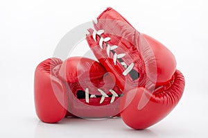 Red boxing gloves isolated on white