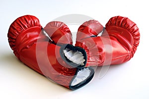 Red boxing gloves on white