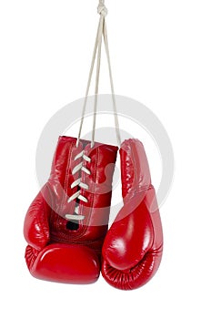 Red boxing gloves on white background