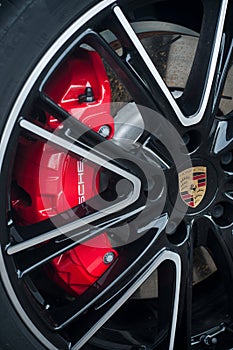 red break on wheel of Porsche sport car