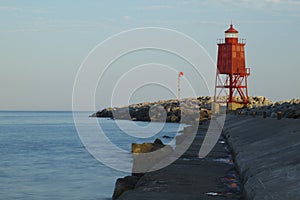 Red Breakwater Lighthouse Along Lake Michigan