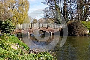 Red brick arched bridge at Upper Woodford - Wiltshire, United Kingdom