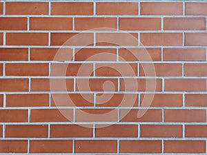 Red brick block wall show Pattern stack block rough surface texture material background Weld the joints with cement grout